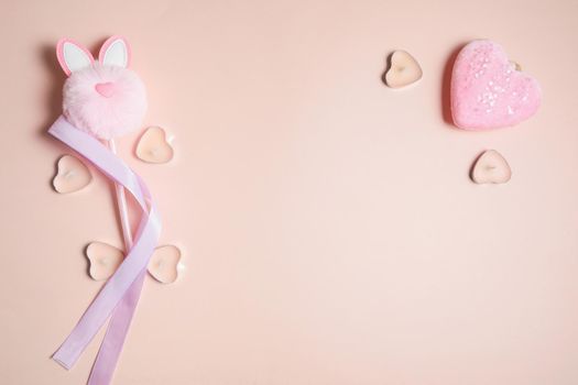 Valentine's Day, composition of hearts on a pink background. View from above. Space for text, flat lay