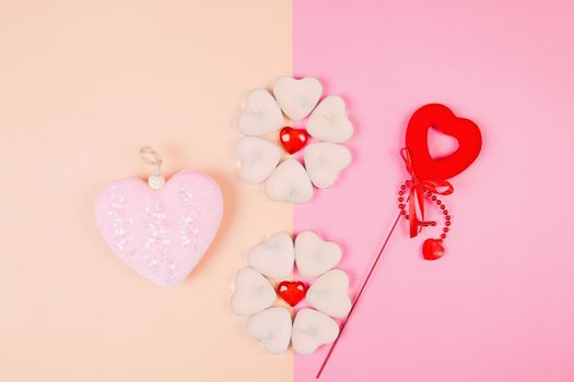 Valentine's Day, composition of hearts on a pink background. View from above. Space for text, flat lay