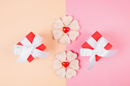 Valentine's Day, composition of hearts on a pink background. View from above. Space for text, flat lay