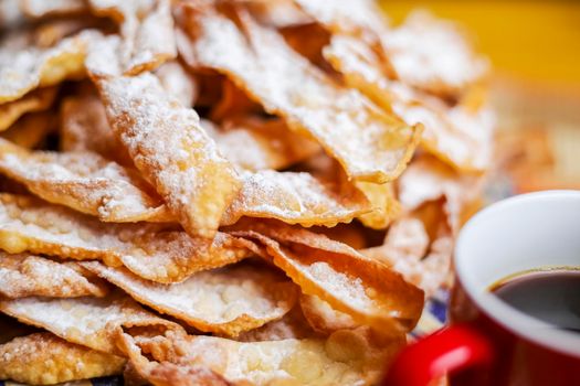 Crunchy pastry, cookies, twigs or crunches in powdered sugar.