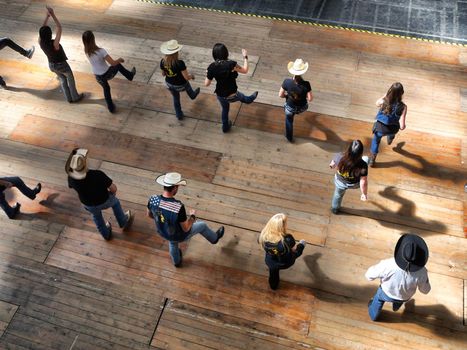 Group of traditional western folk music dancers view from above