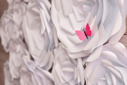 white big paper flowers on wall. handmade craft creative abstraction. High quality photo