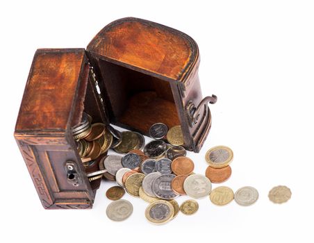 Wooden casket full of coins thai  isolated on white