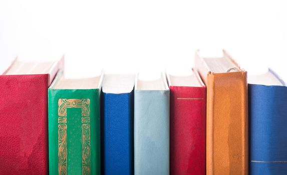 stack of Old books isolated on white.