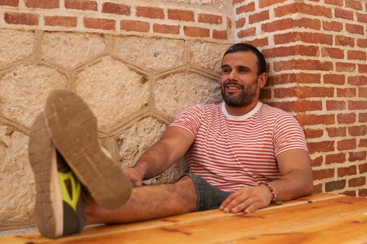 Man sitting on a terrace in summer