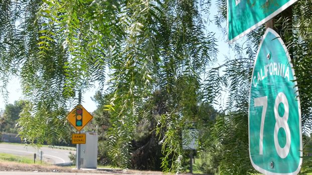 Freeway entrance sign on interchange crossraod in San Diego county, California USA. State Route highway 78 signpost plate. Symbol of road trip, transportation and traffic safety rules and regulations.