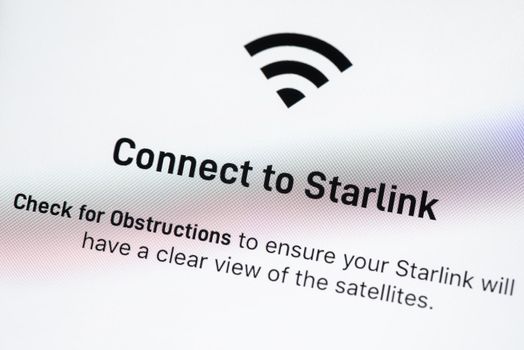 BAYONNE, FRANCE - CIRCA FEBRUARY 2021: Starlink app on Apple iPhone screen. Starlink is a satellite internet constellation being constructed by SpaceX to provide satellite internet access.