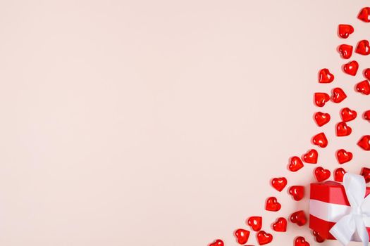 Valentine's Day, composition of hearts on a pink background. View from above. Space for text, flat lay