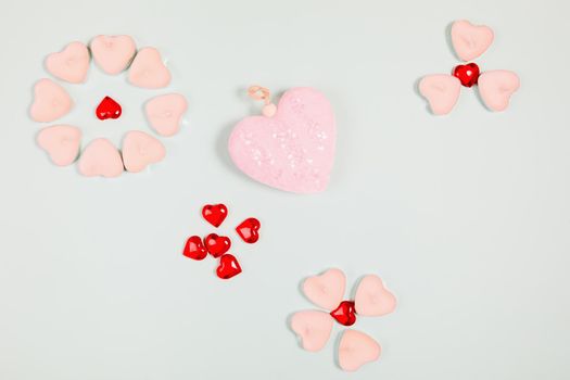 Valentine's Day, composition of hearts on a blue background. View from above. Space for text, flat lay