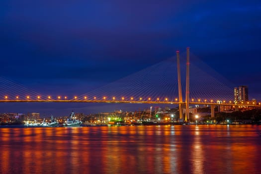 Vladivostok, Russia. Urban landscape with views of the Golden bridge and ships.