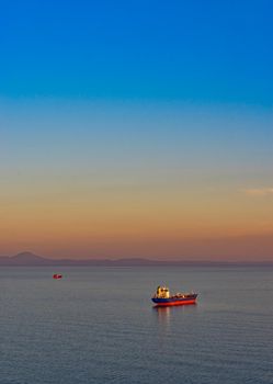 Seascape with tanker and ships on the background of the sea and coastline. Vladivostok, Russia