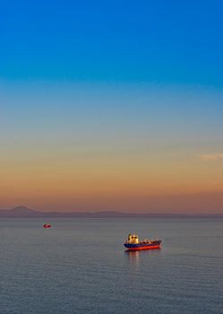 Seascape with tanker and ships on the background of the sea and coastline. Vladivostok, Russia