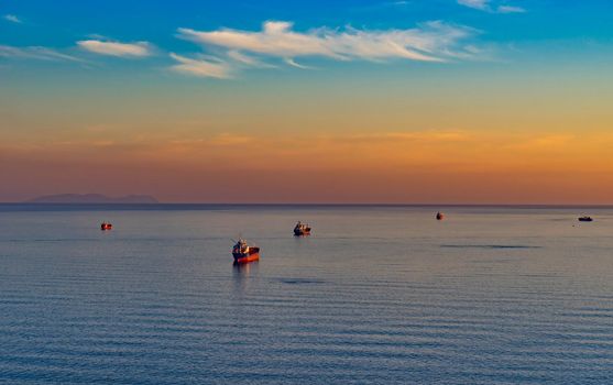 Seascape with tanker and ships on the background of the sea and coastline. Vladivostok, Russia