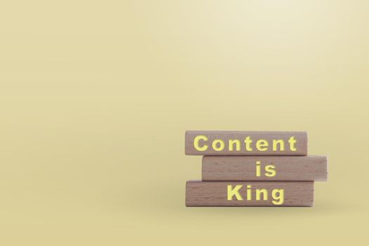 Content is king on wooden board with copy space background. Online business concept.