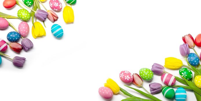 Easter tulips and eggs isolated on white background, border frame corner composition with copy space for text