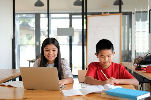 asian boy girl student studying learning lesson online. remote meeting distance education at home