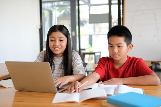 asian boy girl student studying learning lesson online. remote meeting distance education at home