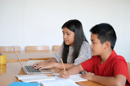 asian boy girl student studying learning lesson online. remote meeting distance education at home