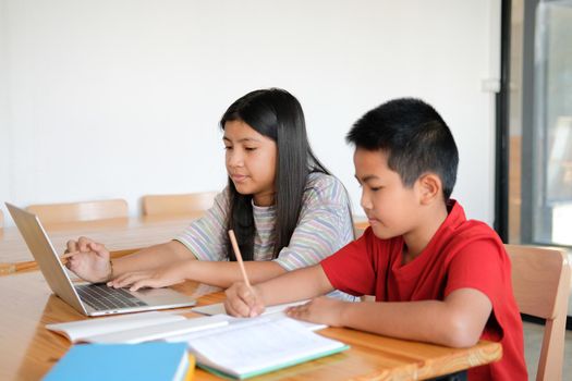 asian boy girl student studying learning lesson online. remote meeting distance education at home