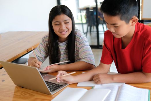 asian boy girl student studying learning lesson online. remote meeting distance education at home