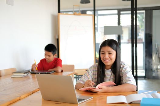 asian boy girl student studying learning lesson online. remote meeting distance education at home