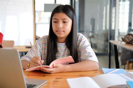 asian girl student studying learning lesson online. remote meeting distance education at home