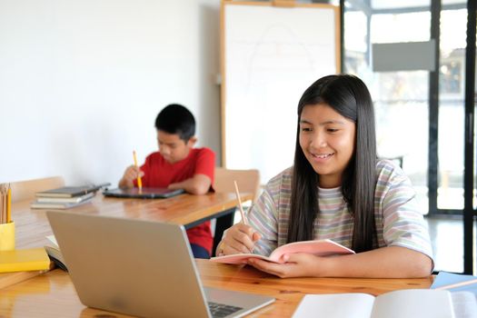 asian boy girl student studying learning lesson online. remote meeting distance education at home