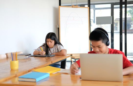 asian boy girl student studying learning lesson online. remote meeting distance education at home