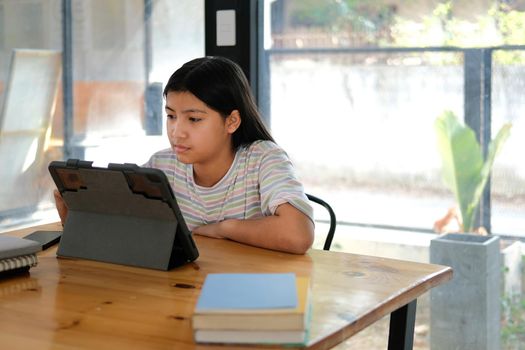 asian girl student studying learning lesson online. remote meeting distance education at home