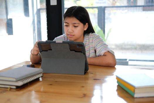 asian girl student studying learning lesson online. remote meeting distance education at home