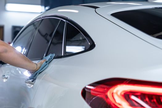 hand polished car body in the car wash.