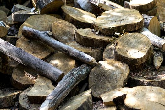 natural background with wooden dice and pieces of tree trunks