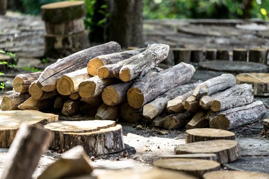 natural background with wooden dice and pieces of tree trunks