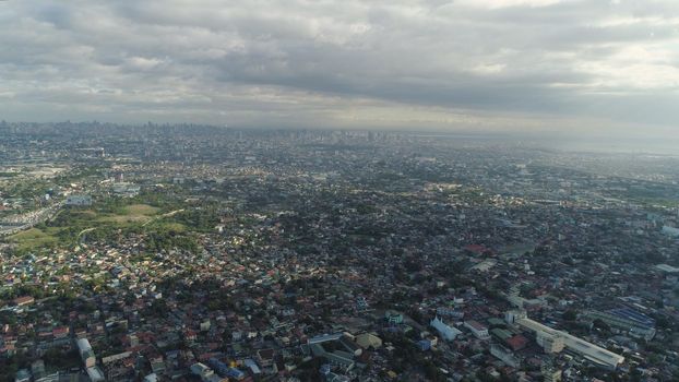 Aerial view of Manila city with skyscrapers and buildings. Philippines, Luzon. Aerial skyline of Manila.
