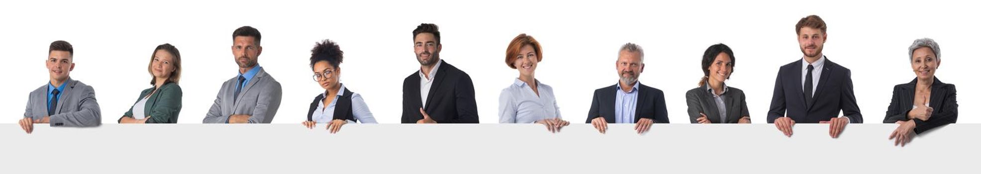 Group of business people holding blank banner ad isolated on white background