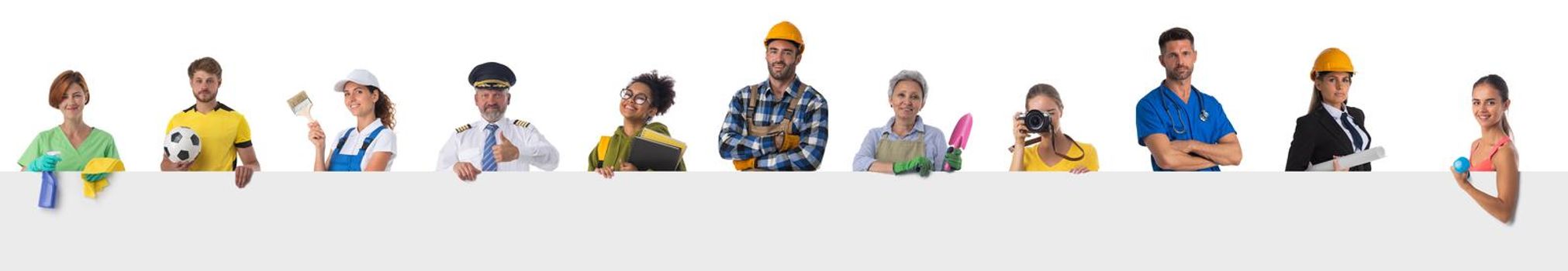 Group of diverse professionals holding blank banner ad isolated on white background