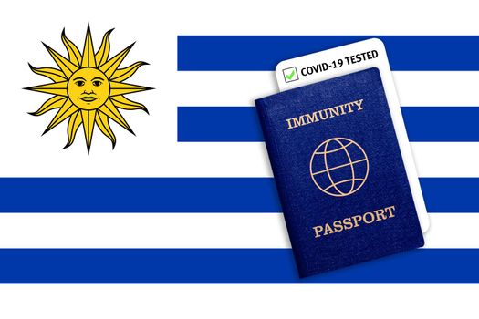 Concept of Immunity passport, certificate for traveling for people who had coronavirus or made vaccine and test result for COVID-19 on flag of Uruguay