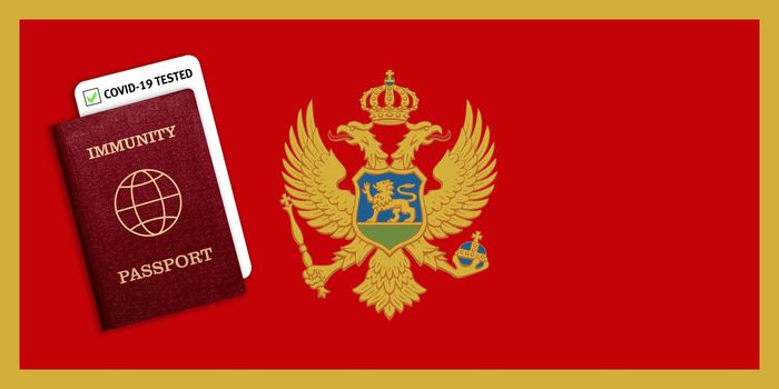 Concept of Immunity passport, certificate for traveling after pandemic for people who have had coronavirus or made vaccine and test result for COVID-19 on flag of Montenegro
