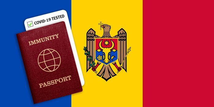 Concept of Immunity passport, certificate for traveling after pandemic for people who have had coronavirus or made vaccine and test result for COVID-19 on flag of Moldova