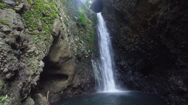 Waterfall in green rainforest. waterfall in the mountain jungle. Bali,Indonesia. Travel concept.