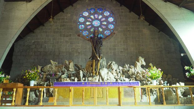 Christ on the Cross in the Interior of Church of St. Mary the Virgin. Sagada, Philippines.