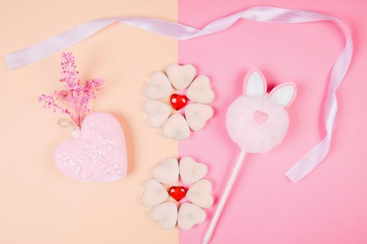 Valentine's Day, composition of hearts on a pink background. View from above. Space for text, flat lay