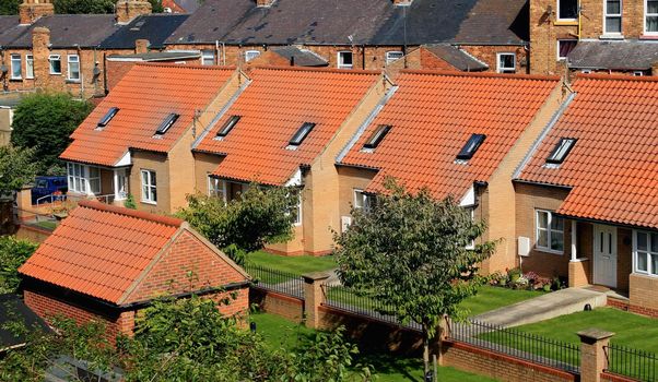 Elevated view of row of town houses in Scarborough, England.