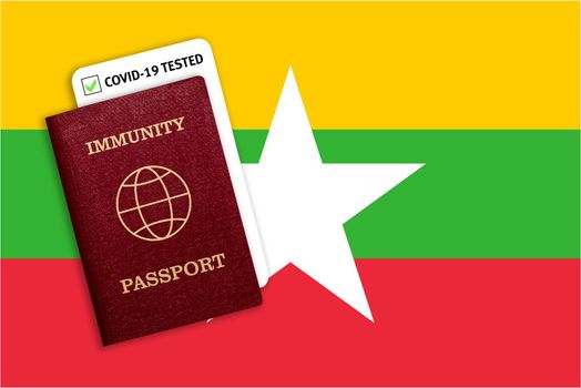 Concept of Immunity passport, certificate for traveling after pandemic for people who have had coronavirus or made vaccine and test result for COVID-19 on flag of Myanmar