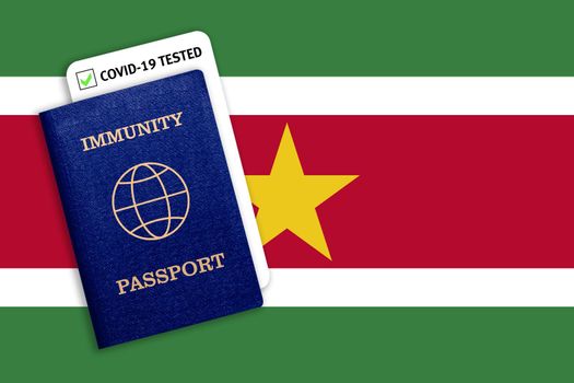 Concept of Immunity passport, certificate for traveling after pandemic for people who have had coronavirus or made vaccine and test result for COVID-19 on flag of Suriname