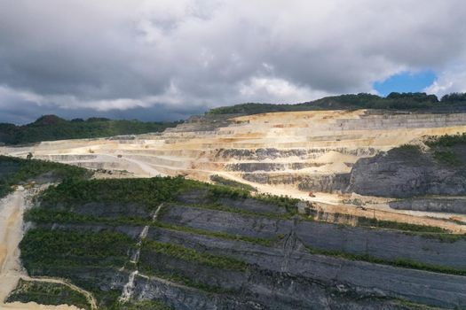 Limestone quarry for the construction industry in the mountains. Bohol, Philippines.