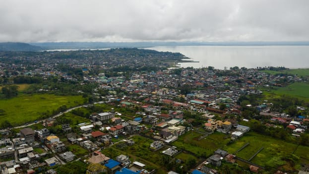 Aerial view of Marawi City located on the shore of lake Lanao restored after the attack of terrorists in 2017. Lanao del Sur, Philippines.