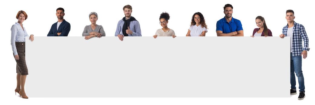 Group of business people in casual clothes holding blank banner ad isolated on white background