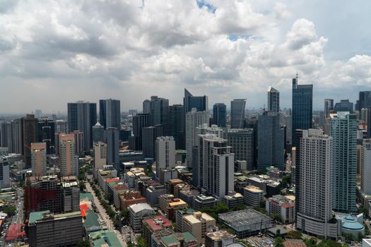 Manila city with skyscrapers, modern buildings and Makati business center. Travel vacation concept.