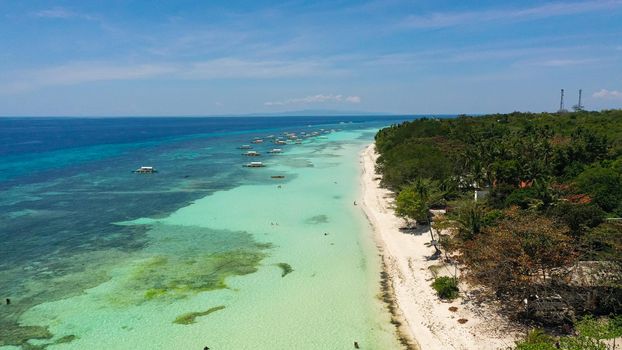 Aerial view of tropical beach on the island Panglao, Philippines. Seascape with beach.
